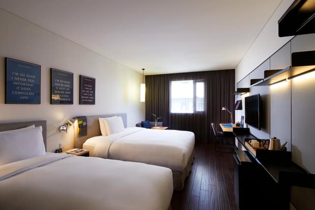 Habitación Deluxe Familiar con Dos Camas · foto 1