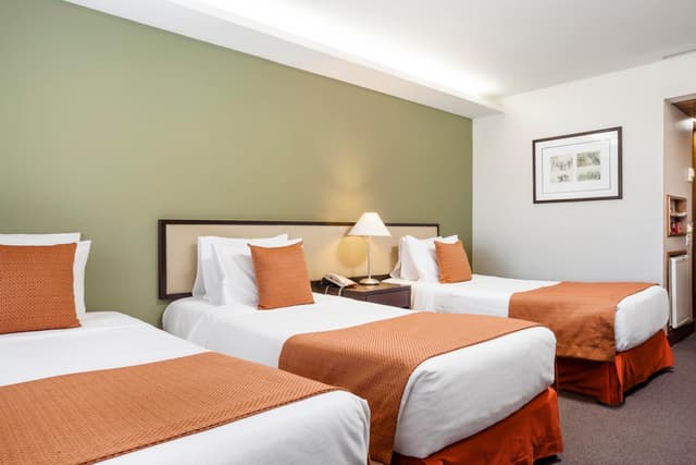 Classic Triple Room with Side Sea View · photo 1