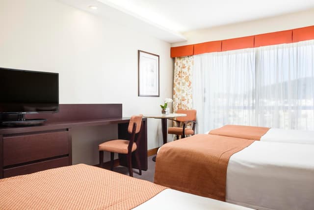 Classic Triple Room with Side Sea View · photo 3