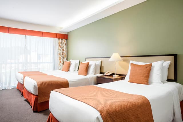 Classic Triple Room with Side Sea View · photo 2
