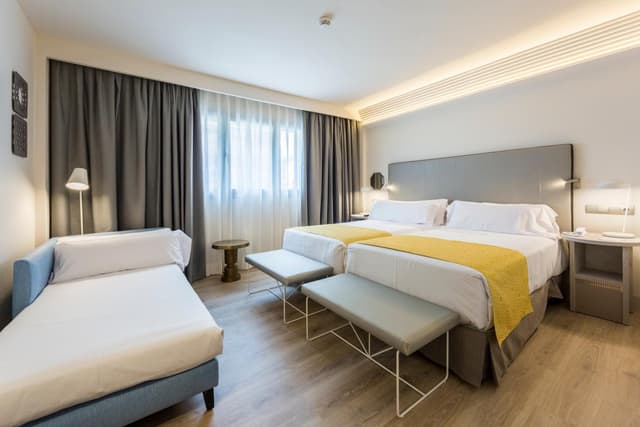 Triple Room (2 Adults + 1 Child) · photo 1