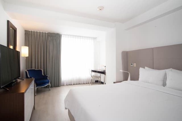 Premium Queen Room · photo 1