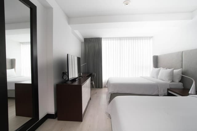 Premium Double Room with Two Double Beds · photo 2