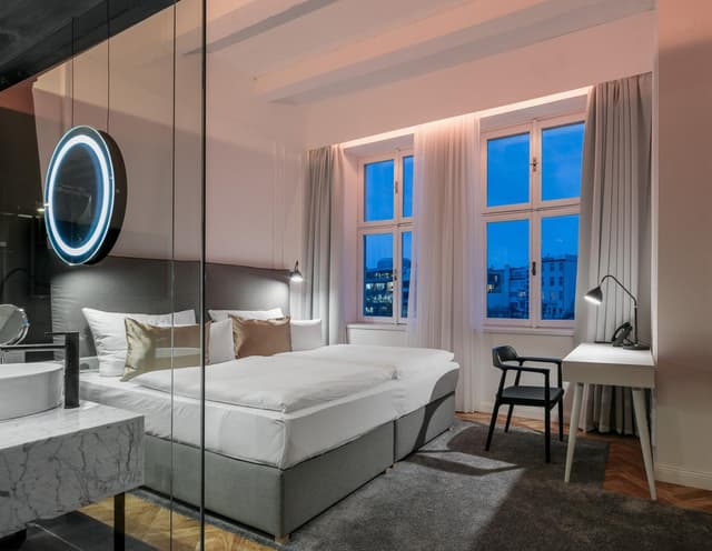 Habitación Doble o con Dos Camas Superior con Cama Adicional y Bañera de Hidromasaje · foto 8