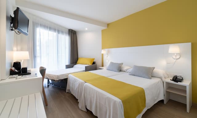 Habitación Doble (2 adultos + 1 niño) · foto 4