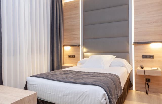 Habitación Doble Económica o con Dos Camas (2 Adultos + 1 Niño) · foto 1