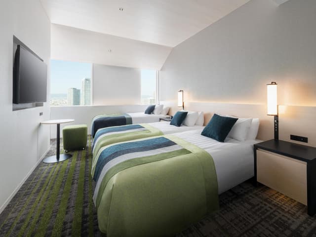 Universal Triple Room - Non-Smoking · photo 1