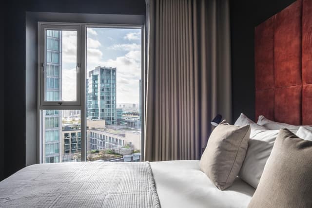 hotel room with a view of the city below?