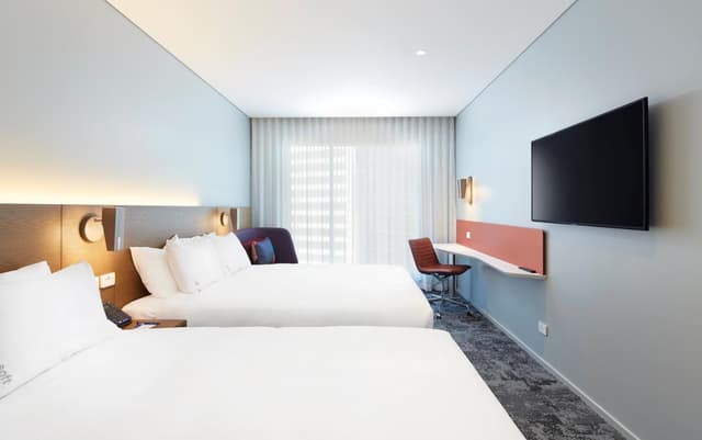 Standard Queen Room with Two Queen Beds - Free Breakfast · photo 4