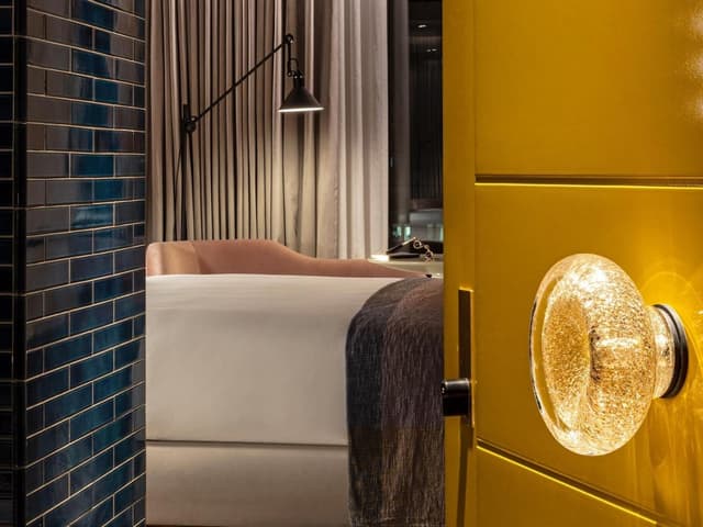 bathroom with a bathtub in the middle of it