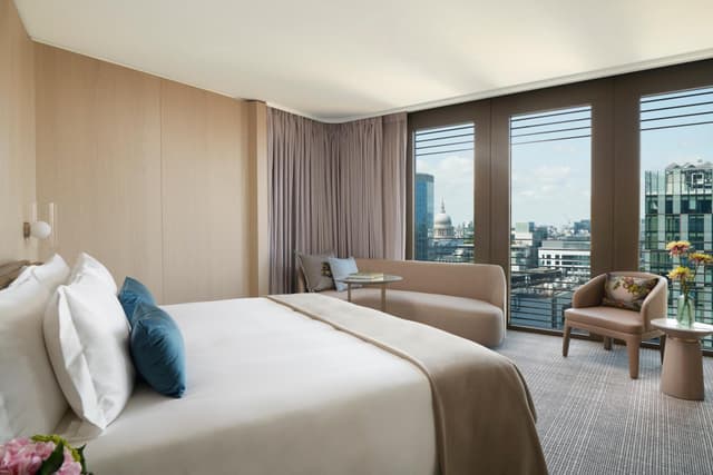 photo of a hotel room with a view of the city