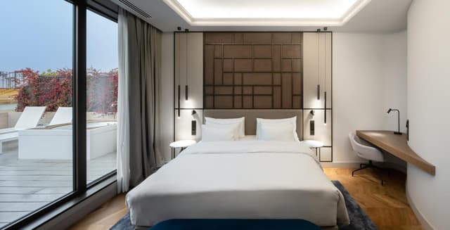 Habitación de la Colección Premium con Terraza y Bañera de Hidromasaje · foto 2