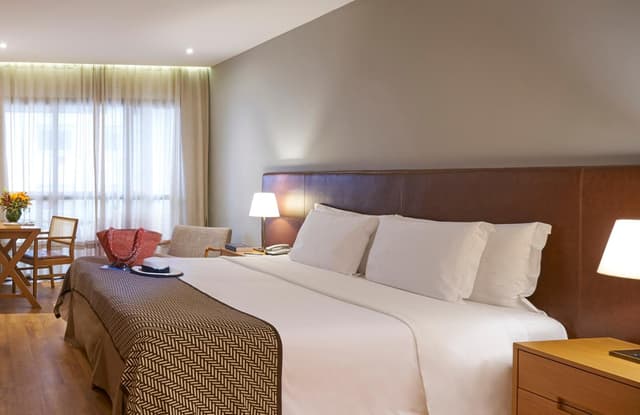 Superior Room with Balcony and Side Sea View · photo 1