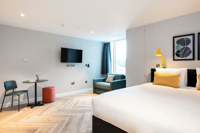 Relax in stylish comfort with modern amenities.