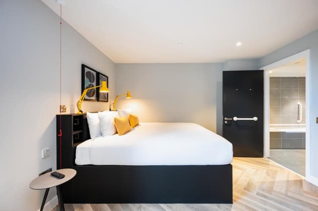 Relax in style with our cozy hotel room!