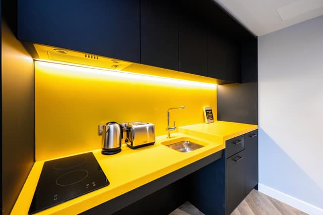 Experience culinary delights in a vibrant, fully-equipped kitchen!