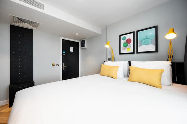 Experience comfort and style in our cozy hotel room.
