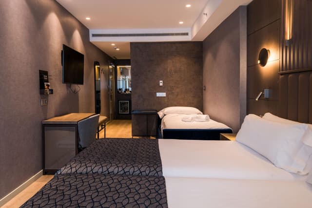 Habitación Premium (2 adultos + 1 niño) · foto 3