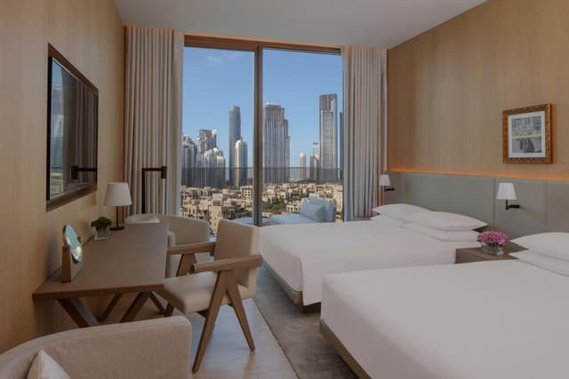 Guest Room With Two Queen Beds And Balcony · photo 2