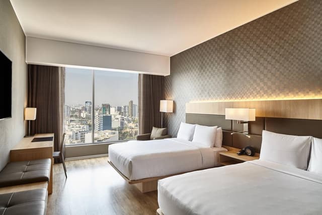 City Deluxe, Deluxe Guest Room, 2 Double, City view · photo 4