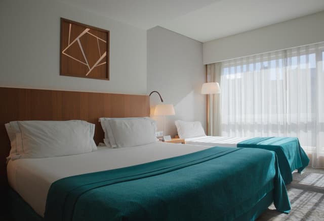Deluxe Double Room with Extra Bed (2 Adults + 1 child up to 12 years old) · photo 2