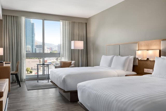 Standard Guest Room with Two Double Beds and Mountain View · photo 1