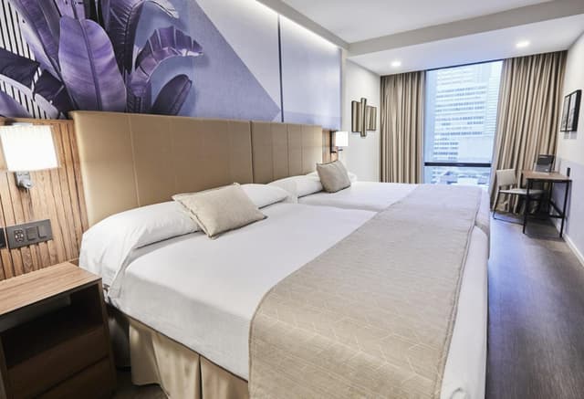 Deluxe Two Queen Beds · photo 2