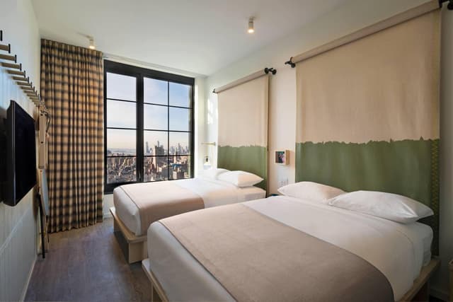 Double Room with Two Double Bed - City View · photo 1