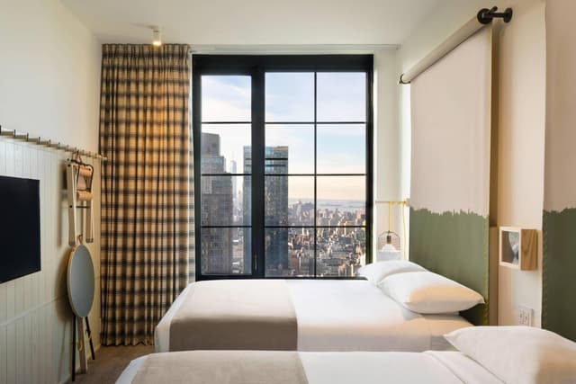 Double Room with Two Double Bed - City View · photo 3