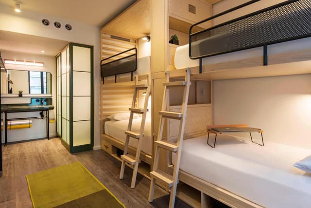 Room with Two Sets of Bunk Beds and Roll-In Shower - Mobility Access · photo 5