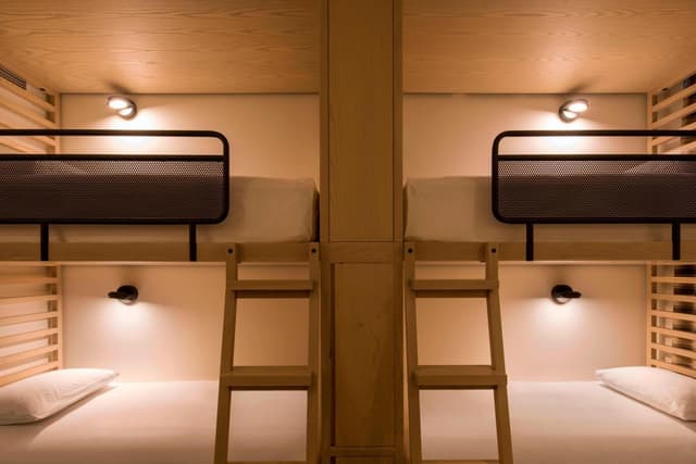 Room with Two Sets of Bunk Beds and Roll-In Shower - Mobility Access · photo 2