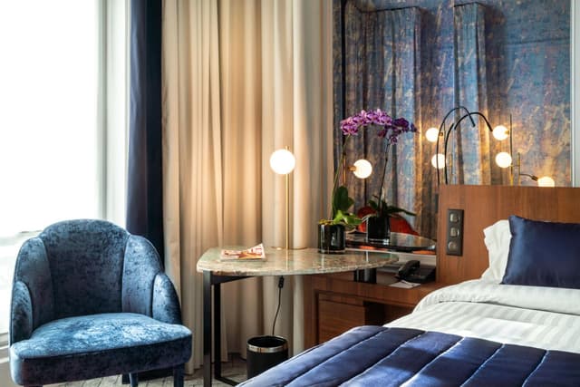 Habitación Signature con una cama Queen · foto 1