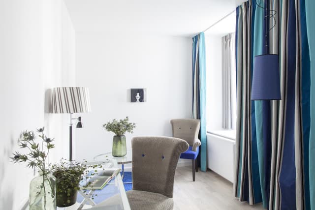 Relax in this stylish and serene hotel room!