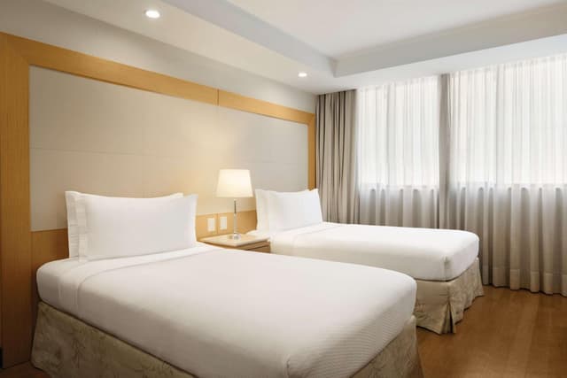 Twin Room with Two Twin Beds - City View · photo 5