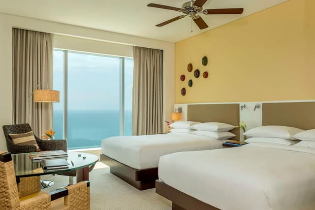 Habitación Doble con Dos Camas Dobles y Vista al Océano · foto 2