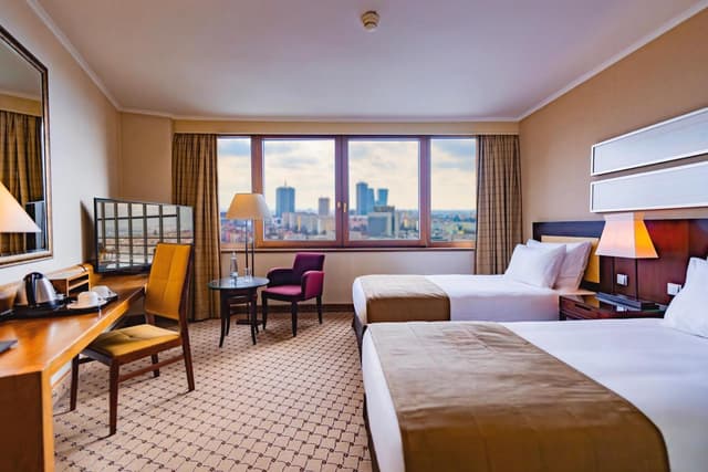 Habitación Ejecutiva con Vista Panorámica a la Ciudad y Acceso al Salón Ejecutivo · foto 1
