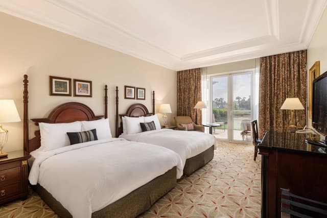 Habitación de huéspedes doble de lujo con acceso al jardín, 2 camas · foto 1