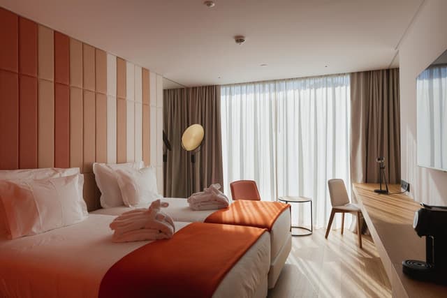 Deluxe Double Room Single Use with City View · photo 1