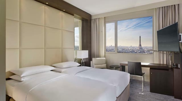 Habitación Doble con Vista a la Torre Eiffel · foto 1