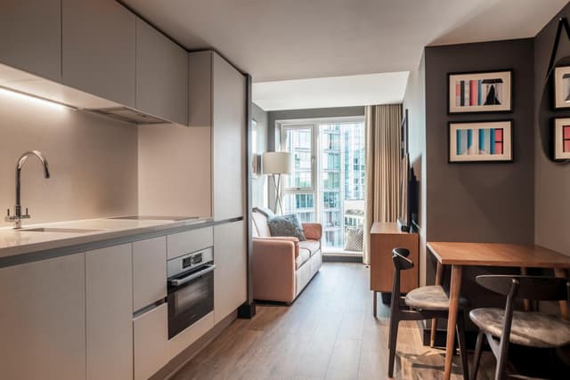 view of the kitchen and living room from the dining area