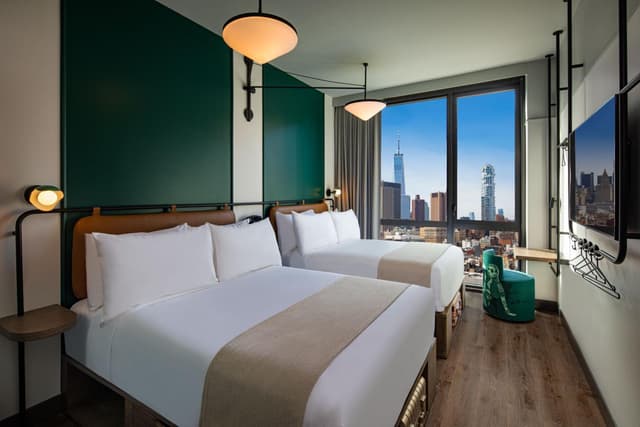 Habitación Doble con Dos Camas Dobles – Vista a la Ciudad · foto 1
