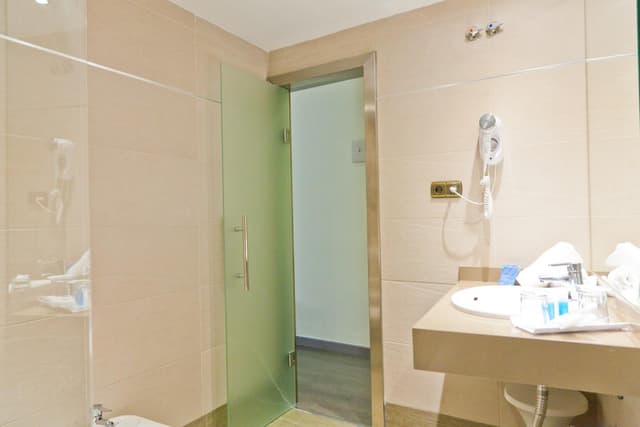 Habitación triple (2 adultos + 1 niño) · foto 6