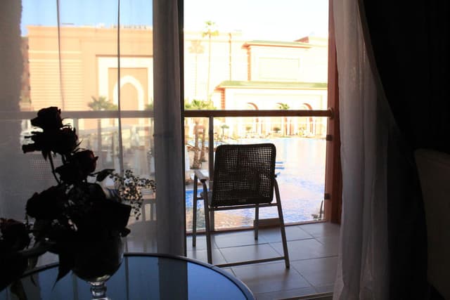 Premium Room Pool View King Bed · photo 3