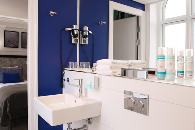 Enjoy a refreshing retreat in our stylish bathroom!