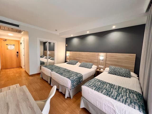 Triple Room · photo 1