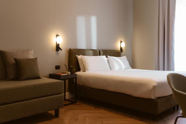 Deluxe Double Room with Sofa Bed · photo 4