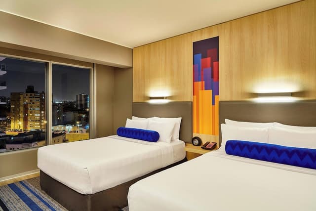 Deluxe Room, 2 Queen Beds · photo 1