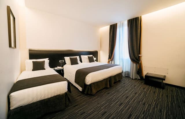 Comfort Room, Multiple Beds · photo 4