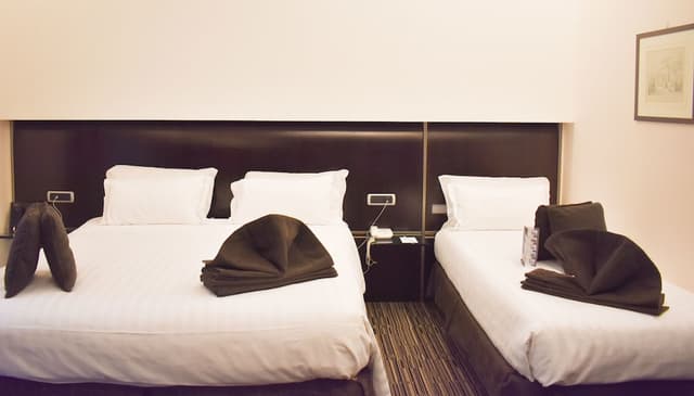 Comfort Room, Multiple Beds · photo 2