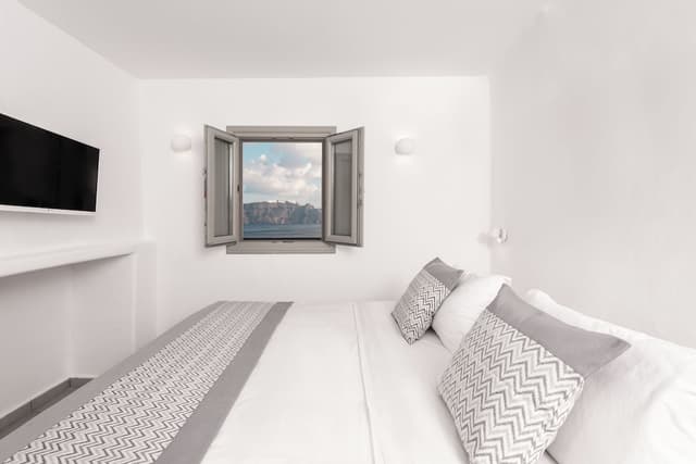 Petit Double Room with Caldera & Sea View · photo 1